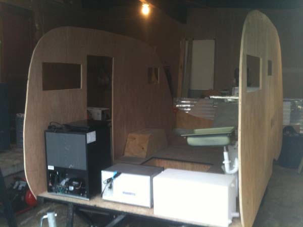 The walls set up and appliances placed for measurements.