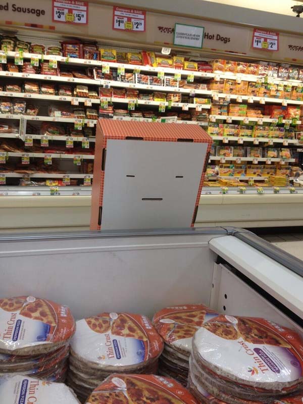 Depressed display shelf struggles to deal with menial tasks.